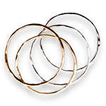 Pulsera en oro y plata de la colección en fondo blanco