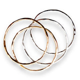 Pulsera en oro y plata de la colección en fondo blanco